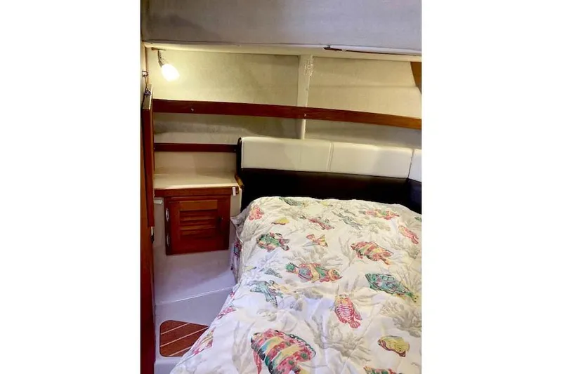 Tootles Yacht Photos Pics Cozy cabin interior of 2016 Ranger Tugs R-31 with colorful bedding.
