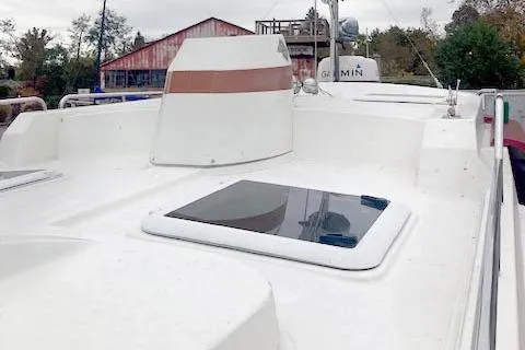 Tootles Yacht Photos Pics 2016 Ranger Tugs R-31 boat deck with hatch and Garmin equipment.