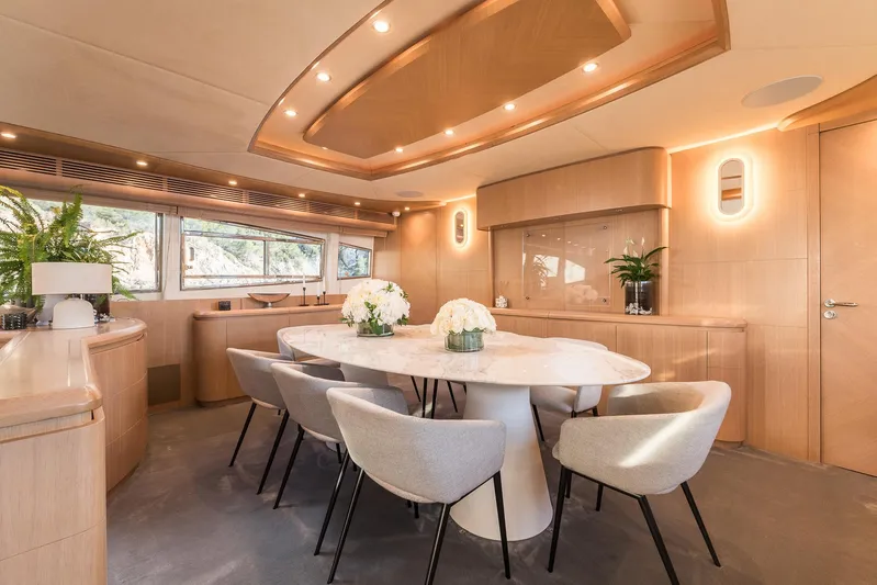  Yacht Photos Pics Luxurious dining area on 2005 Astondoa 102 GLX yacht with elegant decor and modern furnishings.