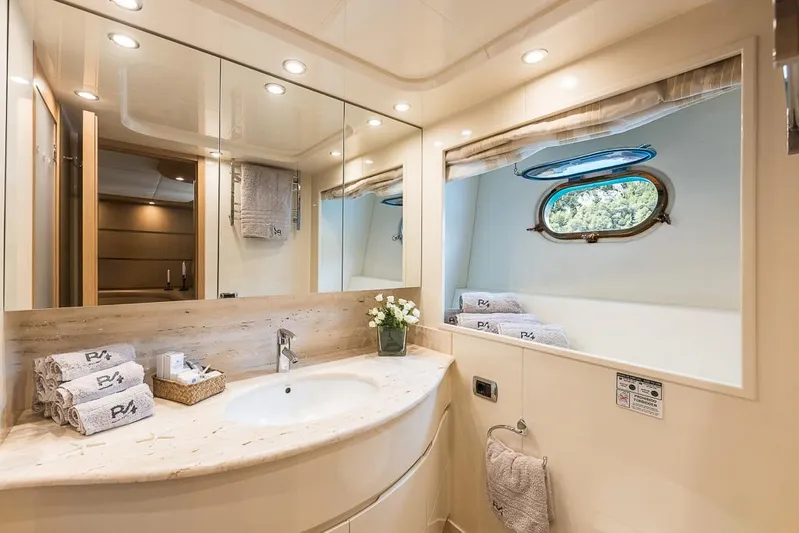  Yacht Photos Pics Luxurious bathroom in 2005 Astondoa 102 GLX yacht, featuring elegant fixtures and natural light.
