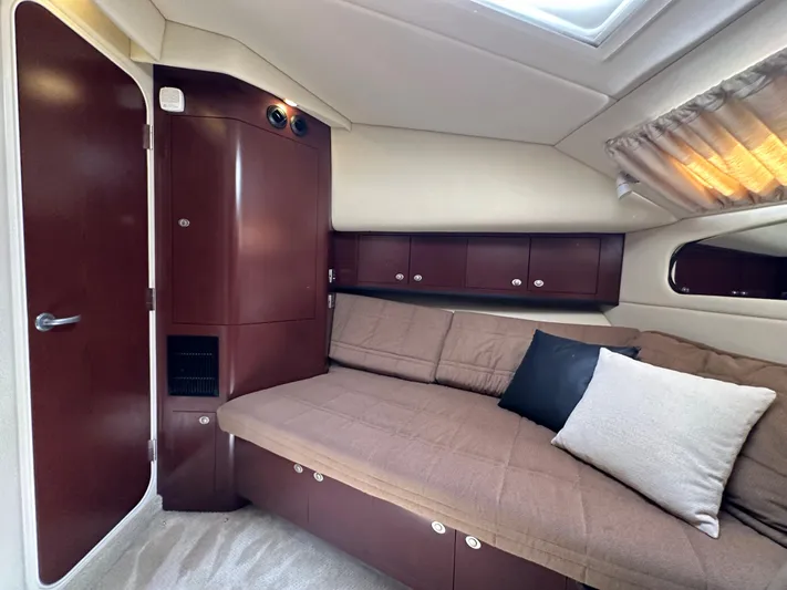 Debs Dinghy Yacht Photos Pics Luxurious interior of 2007 Sea Ray 40 Motor Yacht with plush seating and elegant wood finishes.