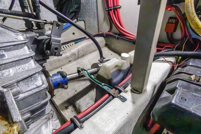 Honey Dew Yacht Photos Pics Engine compartment of a 2000 Sabre 34 Flybridge with visible wiring and components.