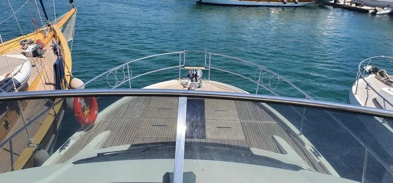 Anahita Yacht Photos Pics 2015 Beneteau Monte Carlo 6 yacht docked at marina, view from deck.