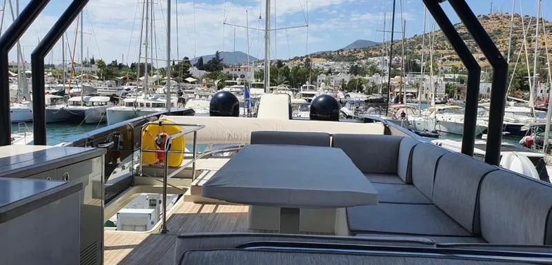 Anahita Yacht Photos Pics Luxurious 2015 Beneteau Monte Carlo 6 yacht interior with marina view.