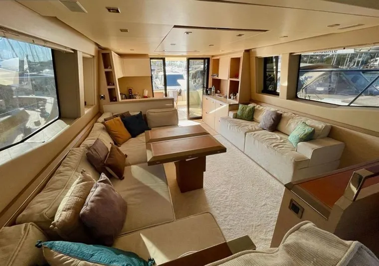 Anahita Yacht Photos Pics Luxurious interior of 2015 Beneteau Monte Carlo 6 yacht with spacious seating and elegant decor.
