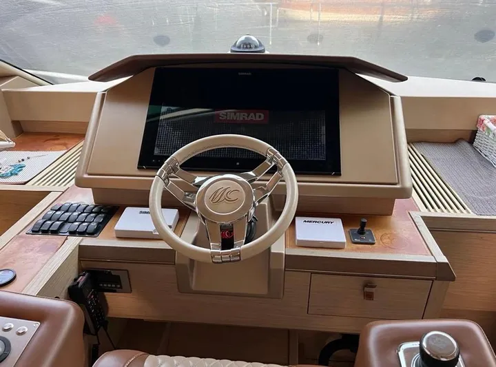 Anahita Yacht Photos Pics Helm of 2015 Beneteau Monte Carlo 6 yacht with Simrad navigation system.