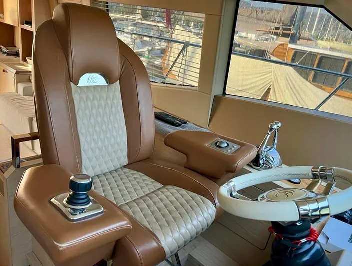 Anahita Yacht Photos Pics Captain's chair and helm of 2015 Beneteau Monte Carlo 6 yacht.