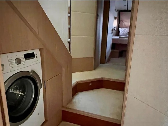 Anahita Yacht Photos Pics Interior of 2015 Beneteau Monte Carlo 6 yacht with washer and cozy bedroom.
