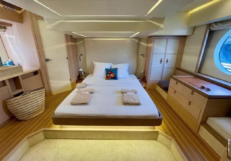 Anahita Yacht Photos Pics Luxurious cabin interior of 2015 Beneteau Monte Carlo 6 yacht, featuring elegant wood finishes.