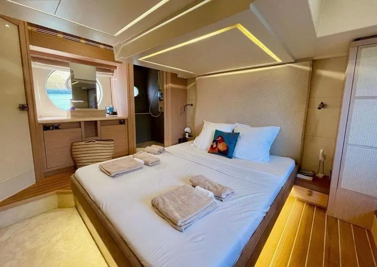 Anahita Yacht Photos Pics Luxurious bedroom interior of 2015 Beneteau Monte Carlo 6 yacht with modern design and cozy ambiance.