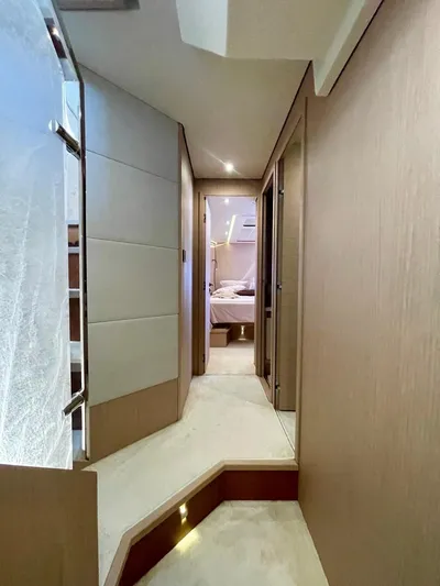 Anahita Yacht Photos Pics 2015 Beneteau Monte Carlo 6 yacht interior hallway leading to bedroom.