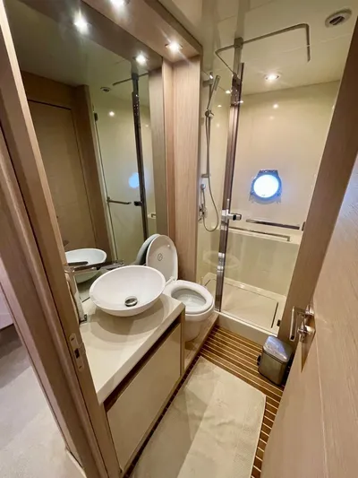 Anahita Yacht Photos Pics Luxurious bathroom in 2015 Beneteau Monte Carlo 6 yacht with modern fixtures and shower.