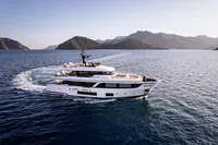 Luxurious 2023 Custom Line Navetta 30 yacht cruising in scenic ocean waters.