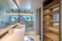 Luxurious bathroom in 2023 Custom Line Navetta 30 yacht with modern design and elegant fixtures.