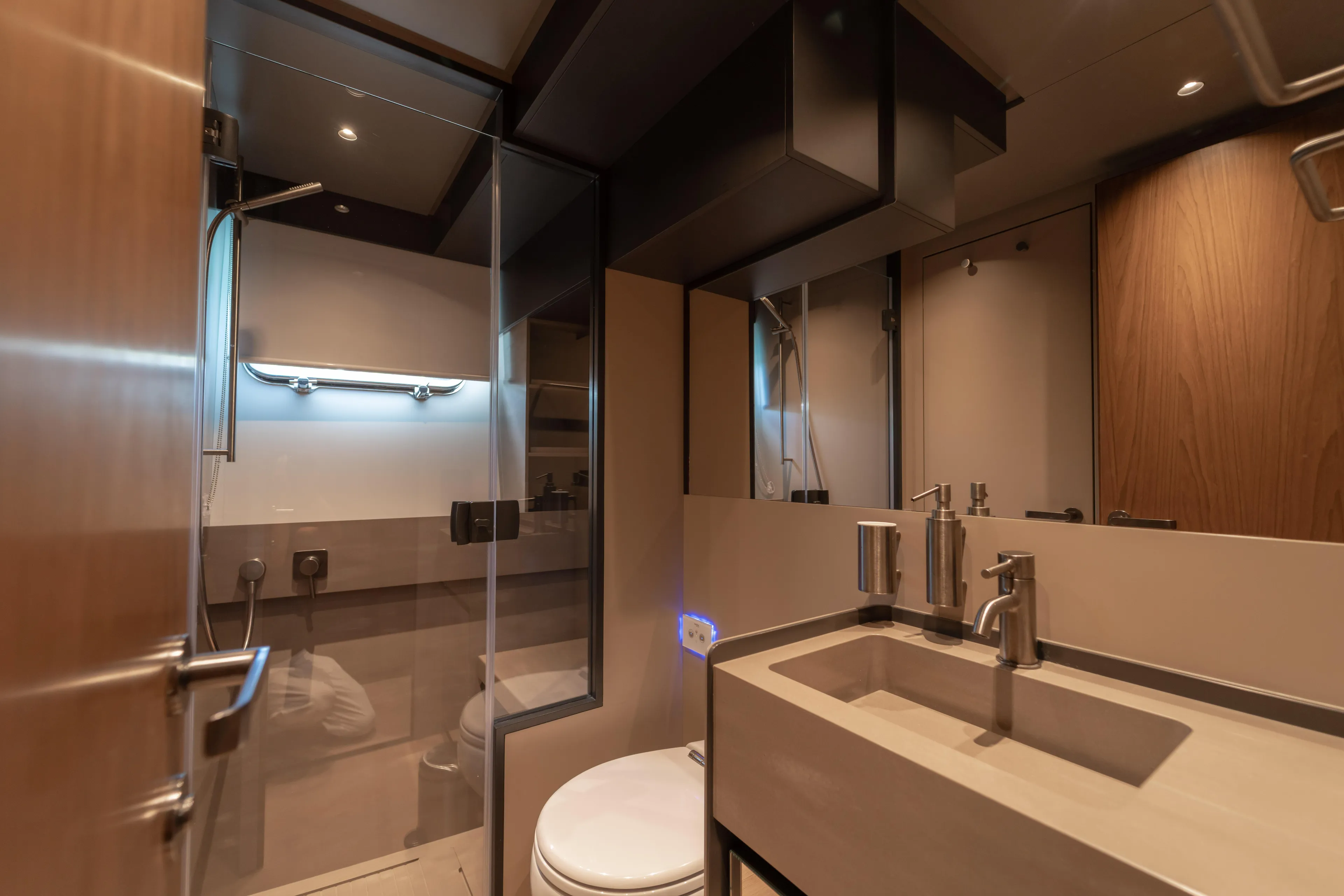  Yacht Photos Pics Modern bathroom interior of 2025 Bluegame BG74 yacht, featuring sleek fixtures and elegant design.