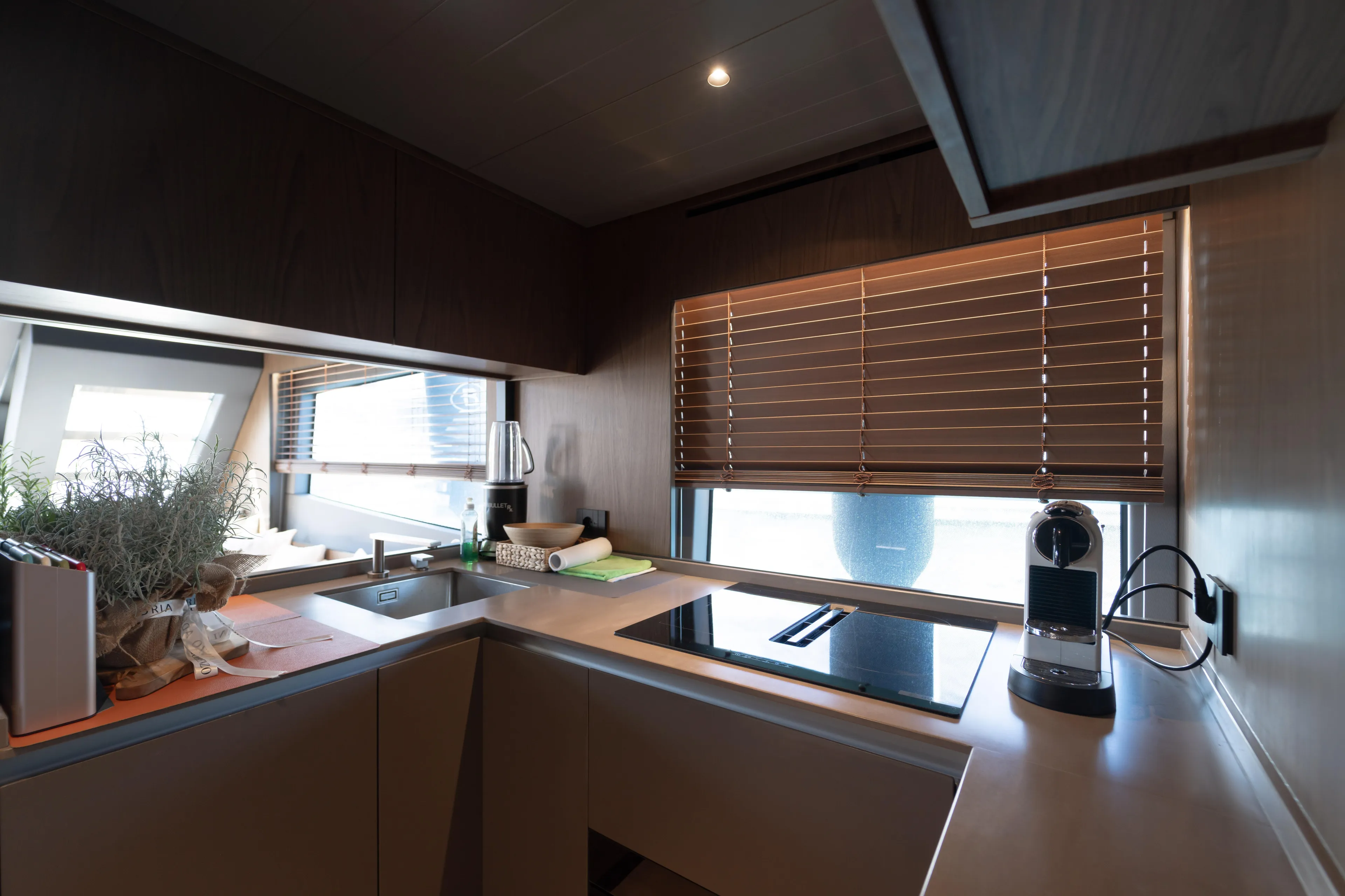 Yacht Photos Pics Modern kitchen interior on 2025 Bluegame BG74 yacht, featuring sleek design and appliances.