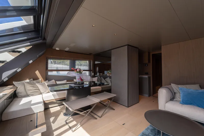  Yacht Photos Pics Luxurious interior of 2025 Bluegame BG74 yacht with modern seating and elegant decor.