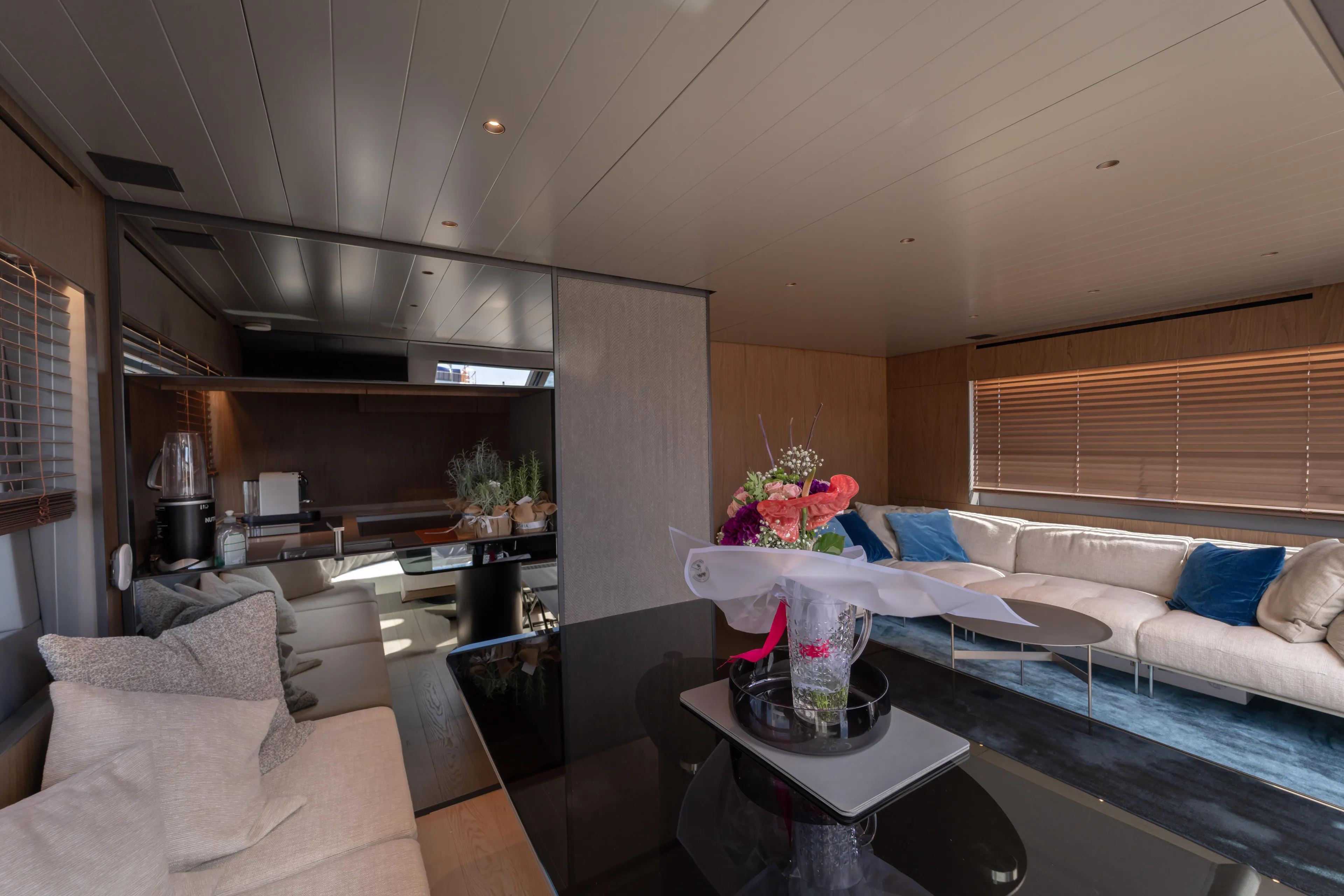  Yacht Photos Pics Luxurious interior of 2025 Bluegame BG74 yacht with modern decor and elegant seating.