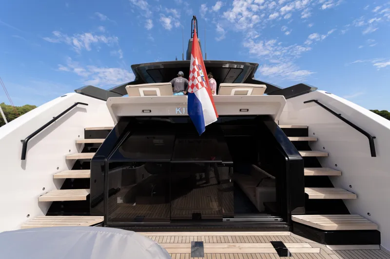  Yacht Photos Pics Luxury Bluegame BG74 yacht, 2025 model, with Croatian flag, elegant design, and spacious deck.