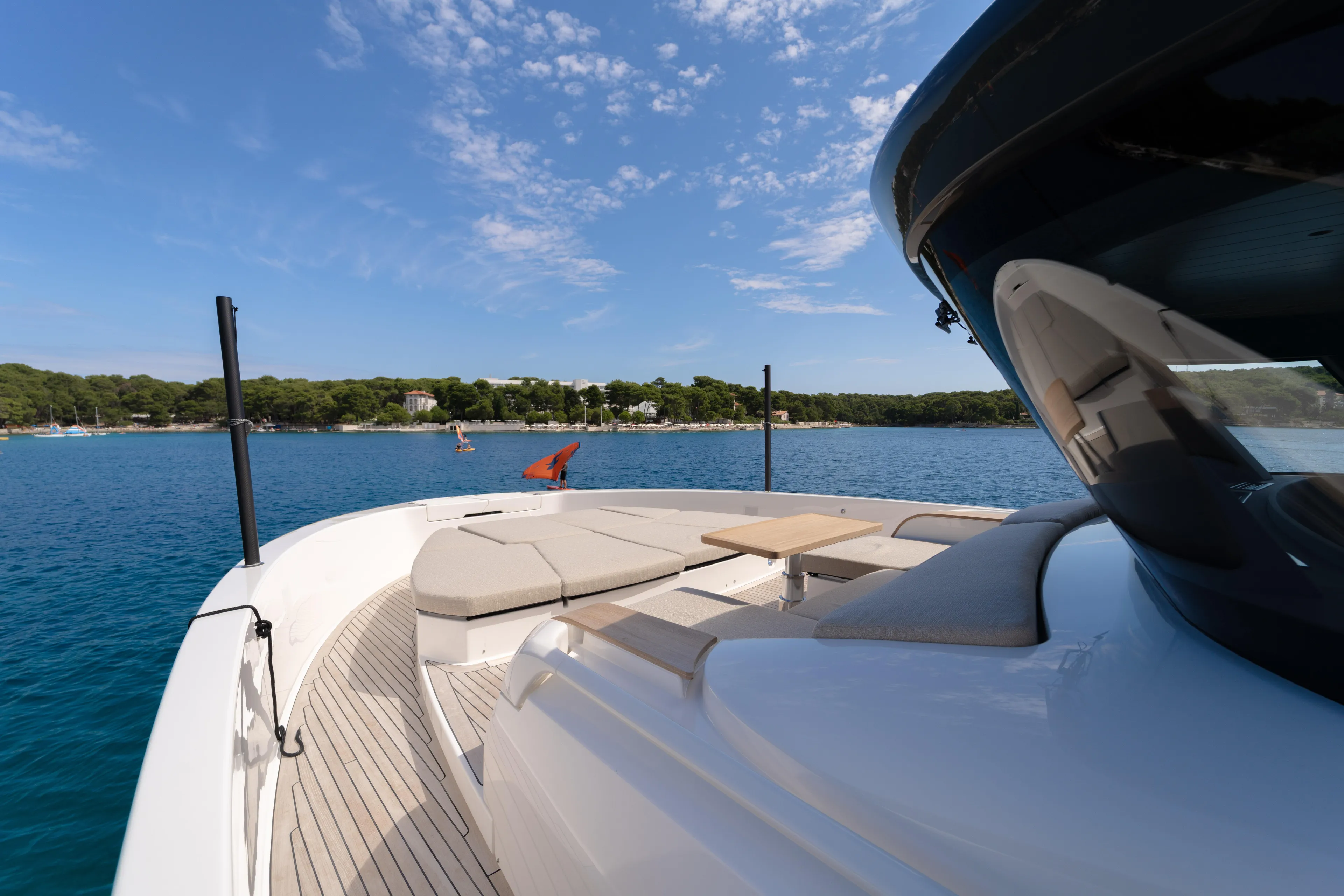  Yacht Photos Pics Luxurious 2025 Bluegame BG74 yacht deck with scenic ocean view.