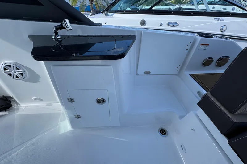  Yacht Photos Pics Interior of 2026 Monterey Elite 27 OB boat with sleek seating and modern fixtures.