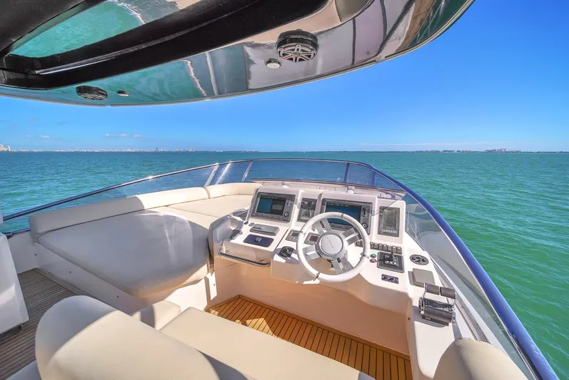  Yacht Photos Pics Azimut Flybridge 2012 yacht helm with ocean view and modern controls.