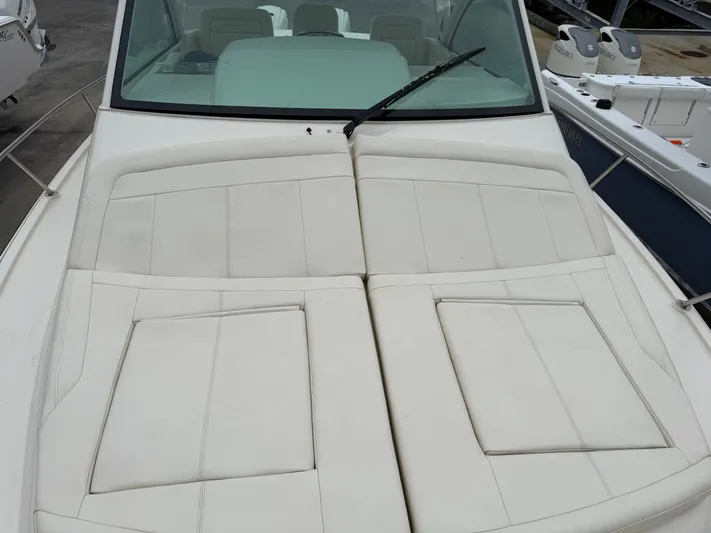  Yacht Photos Pics 2025 Grady-White Express 330 boat with cushioned deck seating.