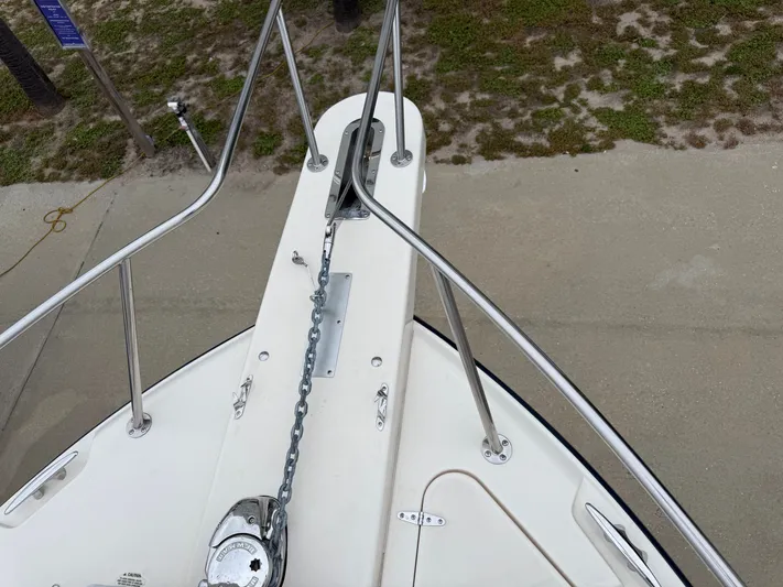  Yacht Photos Pics Bow of 2025 Grady-White Express 330 with anchor chain and railing.