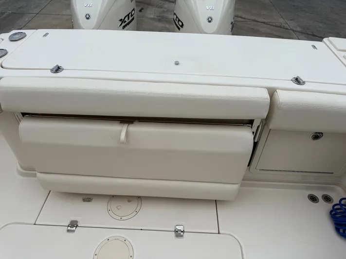  Yacht Photos Pics 2025 Grady-White Express 330 boat seating and deck area with Yamaha V8 engines.