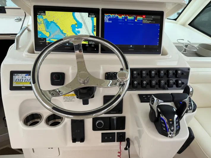  Yacht Photos Pics Helm of 2025 Grady-White Express 330 with advanced navigation and control systems.