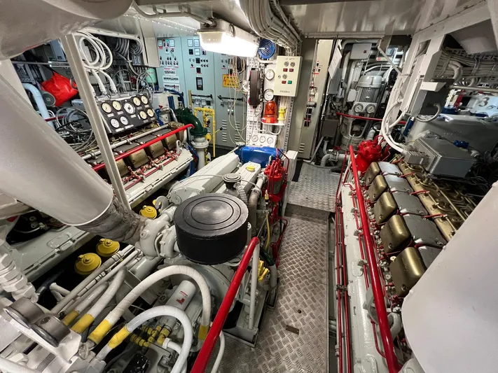 Sanssouci Star Yacht Photos Pics Engine room of 1982 Custom Displacement Twin Screw vessel, showcasing machinery and control panels.