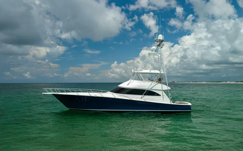 Miss Virginia Yacht Photos Pics 2017 Viking 66 Convertible yacht on open sea under cloudy sky.