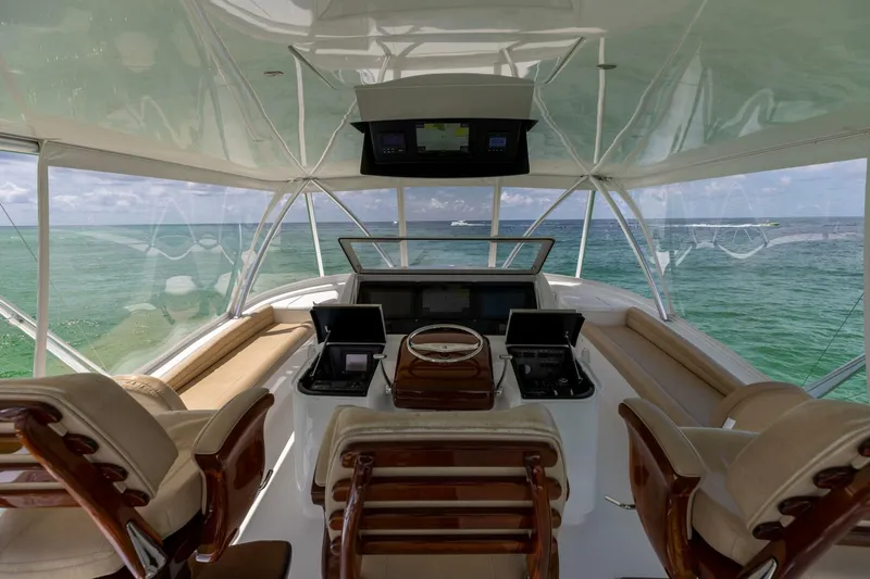 Miss Virginia Yacht Photos Pics Luxurious helm of 2017 Viking 66 Convertible yacht with ocean view.