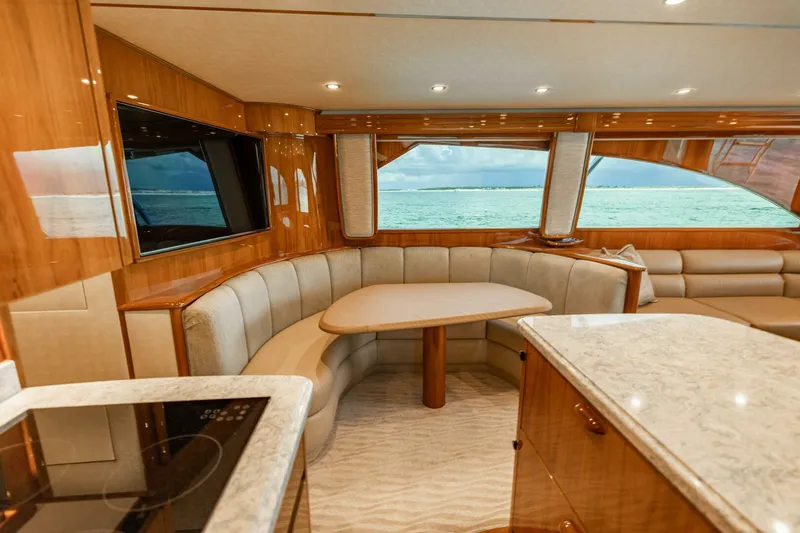 Miss Virginia Yacht Photos Pics Luxurious interior of 2017 Viking 66 Convertible yacht with ocean view.