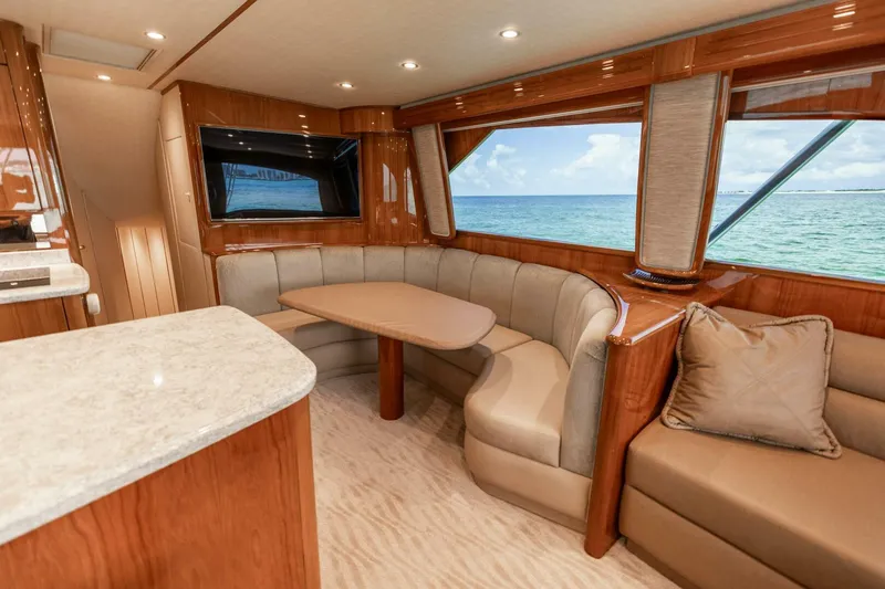 Miss Virginia Yacht Photos Pics Luxurious interior of 2017 Viking 66 Convertible yacht with ocean view.