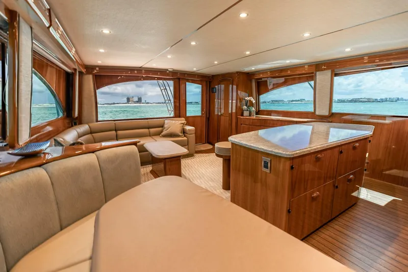 Miss Virginia Yacht Photos Pics Luxurious interior of 2017 Viking 66 Convertible yacht with ocean view.