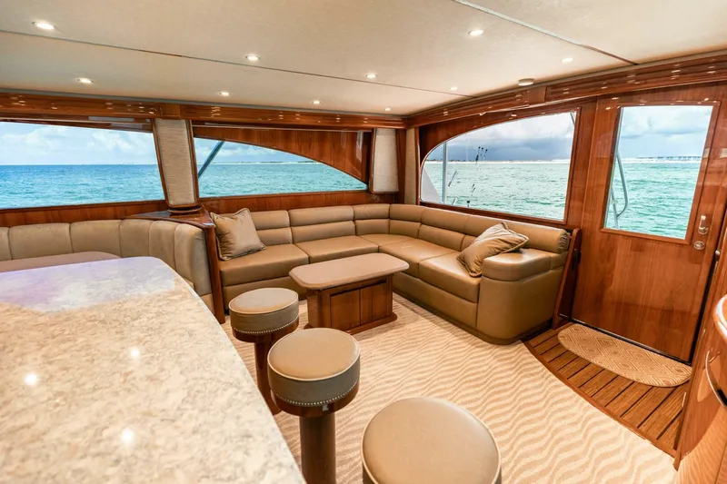 Miss Virginia Yacht Photos Pics Luxurious interior of 2017 Viking 66 Convertible yacht with ocean view.