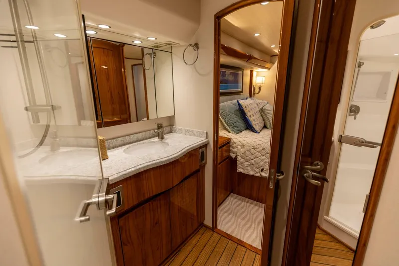 Miss Virginia Yacht Photos Pics Luxurious interior of 2017 Viking 66 Convertible yacht with bedroom and bathroom.