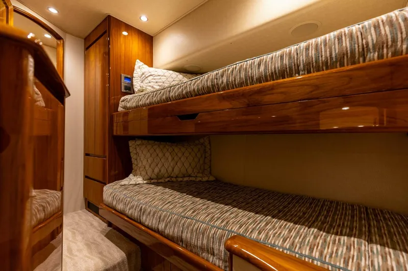 Miss Virginia Yacht Photos Pics Luxurious wooden bunk beds in 2017 Viking 66 Convertible yacht cabin.