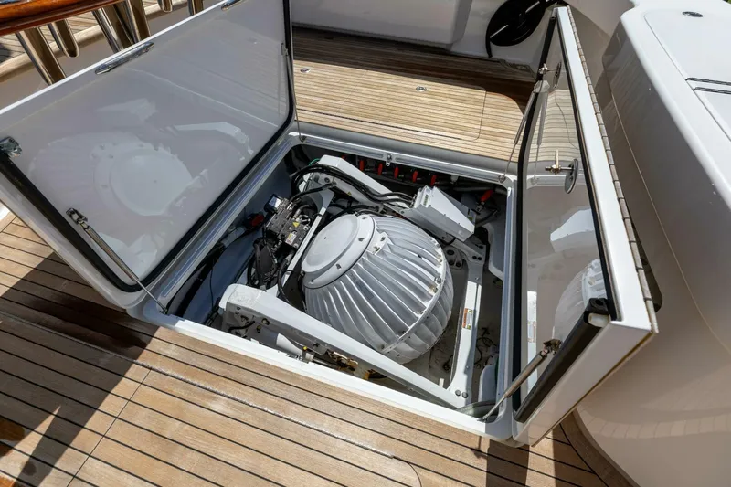Miss Virginia Yacht Photos Pics Engine compartment of 2017 Viking 66 Convertible yacht, showcasing mechanical components.