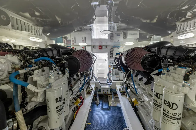 Miss Virginia Yacht Photos Pics Engine room of 2017 Viking 66 Convertible yacht, featuring dual CAT engines and advanced filtration systems.