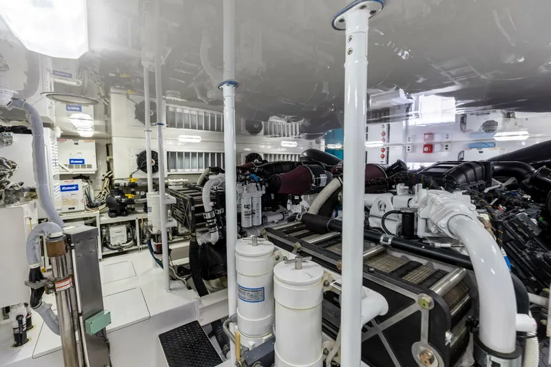 Miss Virginia Yacht Photos Pics Engine room of 2017 Viking 66 Convertible yacht, showcasing advanced machinery and equipment.