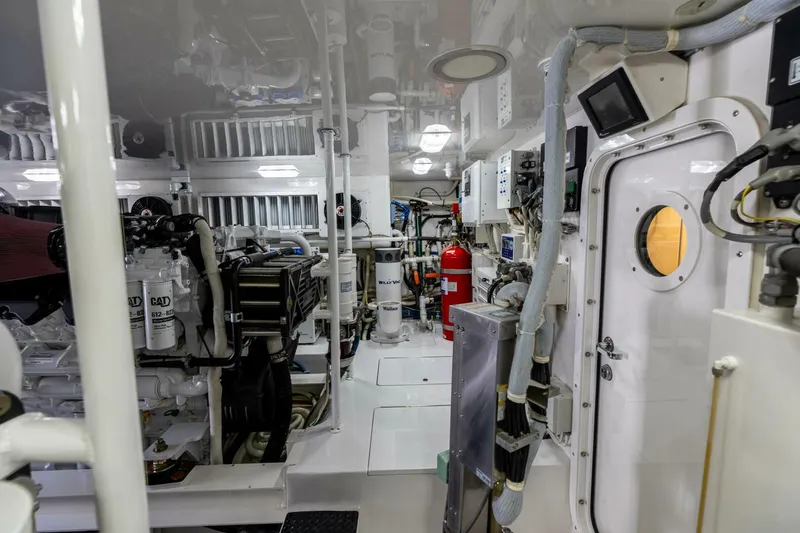 Miss Virginia Yacht Photos Pics Engine room of 2017 Viking 66 Convertible yacht, featuring advanced machinery and equipment.