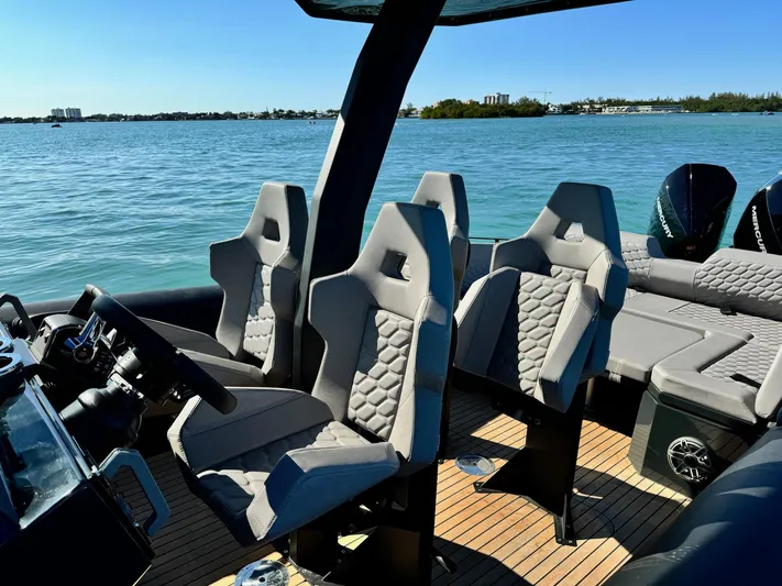 2025 Skipper 34 Twin 300 V8 Yacht Photos Pics Luxury Skipper-BSK 34 boat interior, 2025 model, featuring sleek seating and modern design on open water.