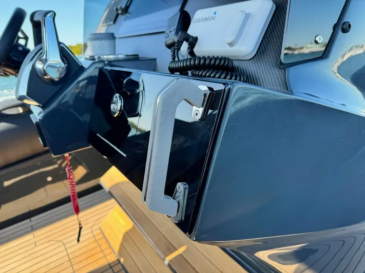 2025 Skipper 34 Twin 300 V8 Yacht Photos Pics Control panel of 2025 Skipper-BSK 34 boat with Garmin device and sleek design.