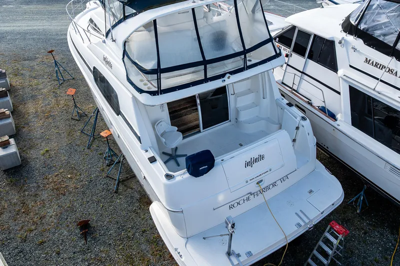 Infinite Yacht Photos Pics 2001 Silverton 410 Sport Bridge yacht on dry dock, Roche Harbor, WA.