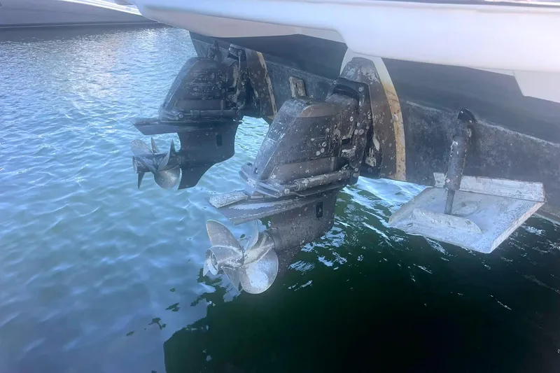  Yacht Photos Pics 2014 Cruisers Yachts 380 Express stern with dual propellers in water.