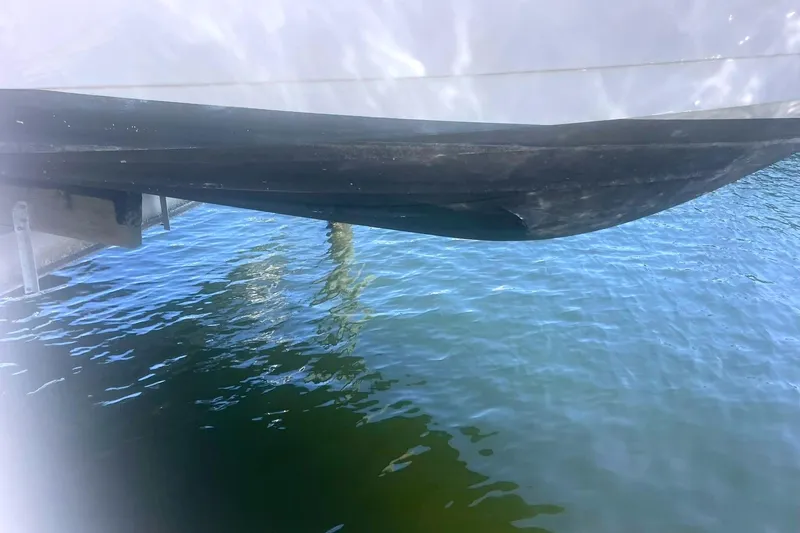  Yacht Photos Pics 2014 Cruisers Yachts 380 Express hull above clear blue water.