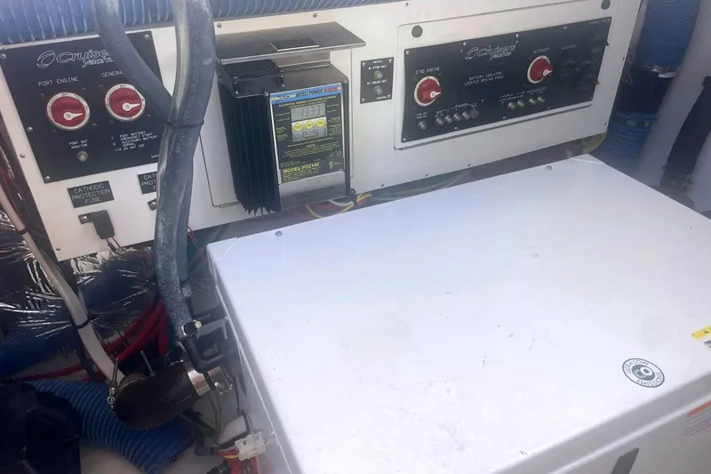  Yacht Photos Pics Control panel of a 2014 Cruisers Yachts 380 Express, featuring engine and generator controls.