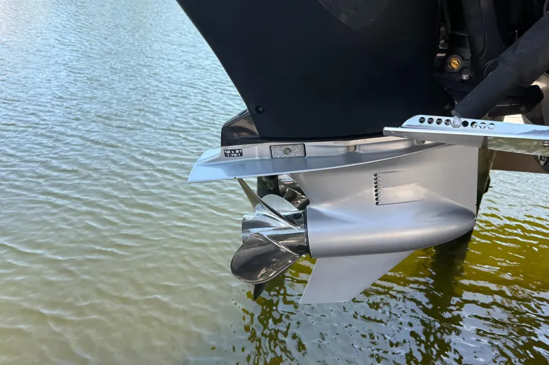  Yacht Photos Pics Outboard motor propeller of 2020 Statement 350 Open on water.